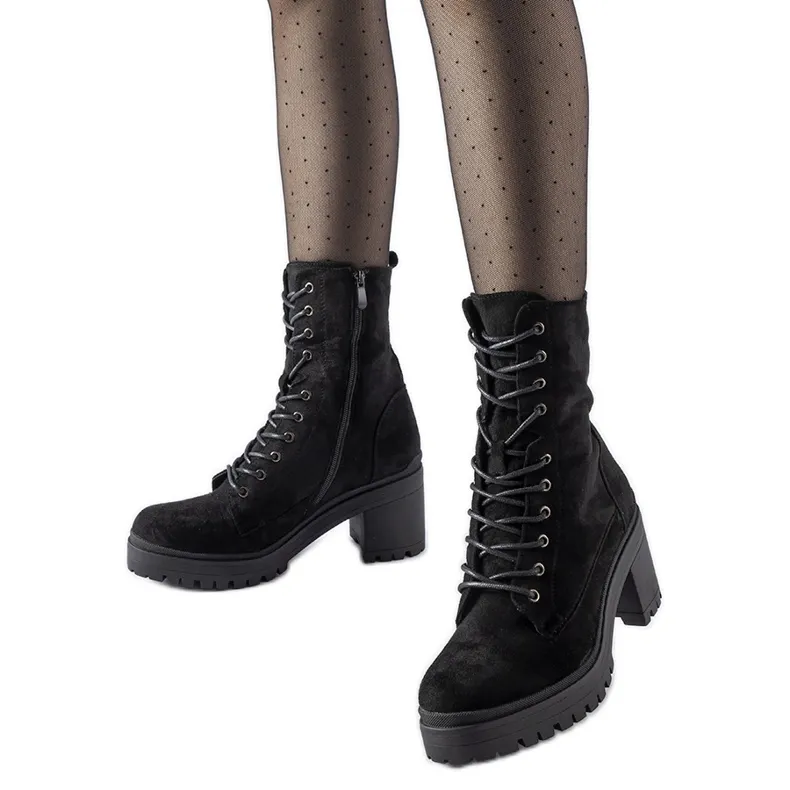 Black insulated boots with a low heel from Cotti